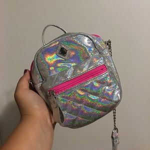 Claire’s silver mini purse! Great for little girls